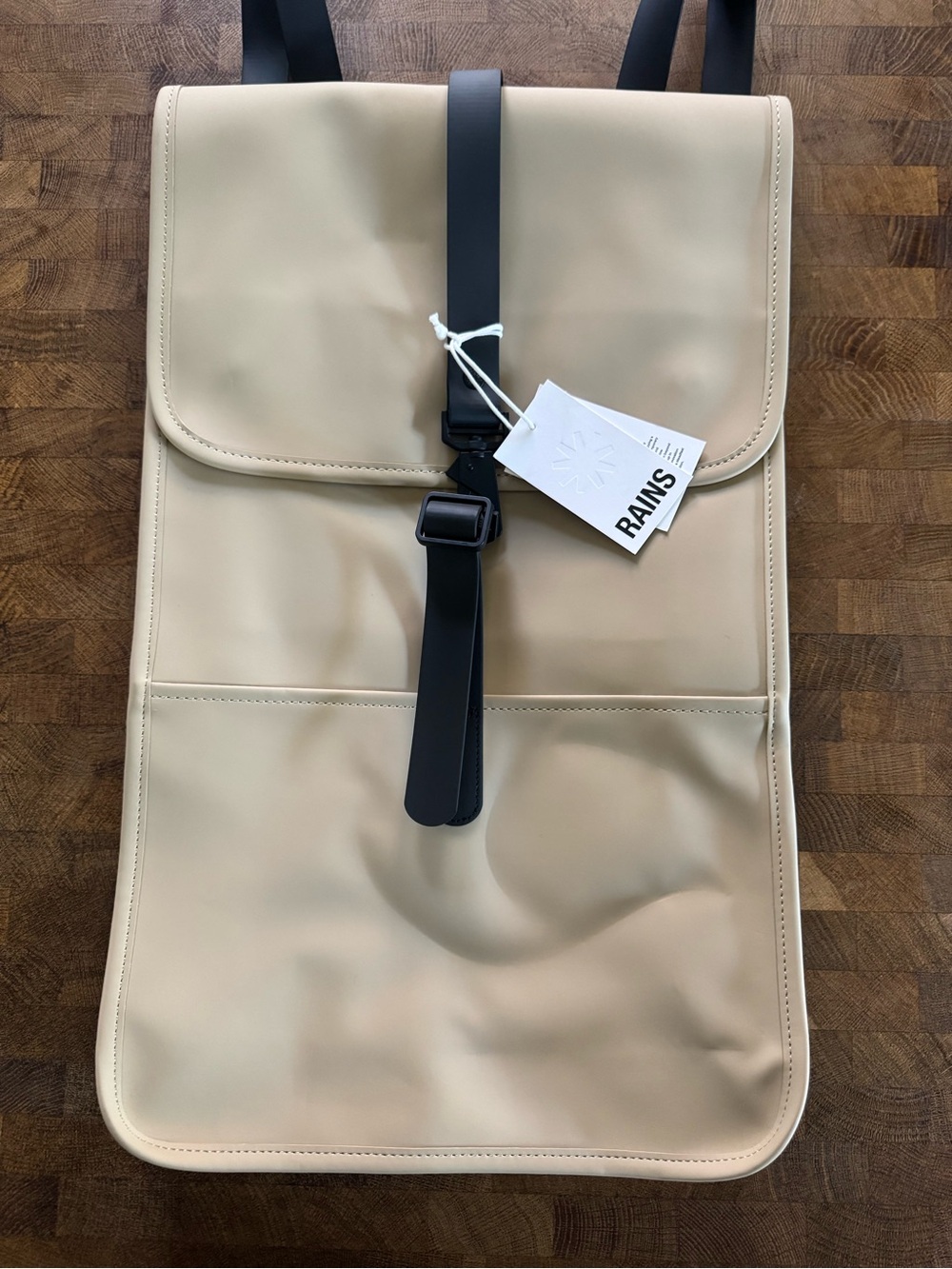 Rains Beige Roll-Top Backpack with Black Strap